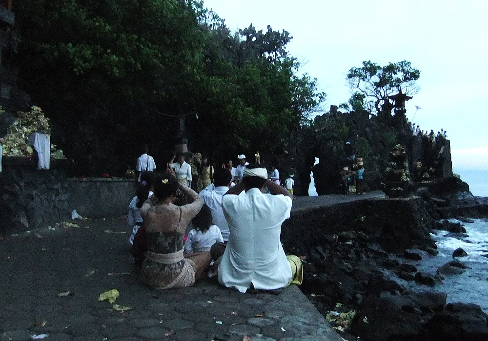 Praying at Pura Batubolong, Senggigi, Lombok, Indonesia