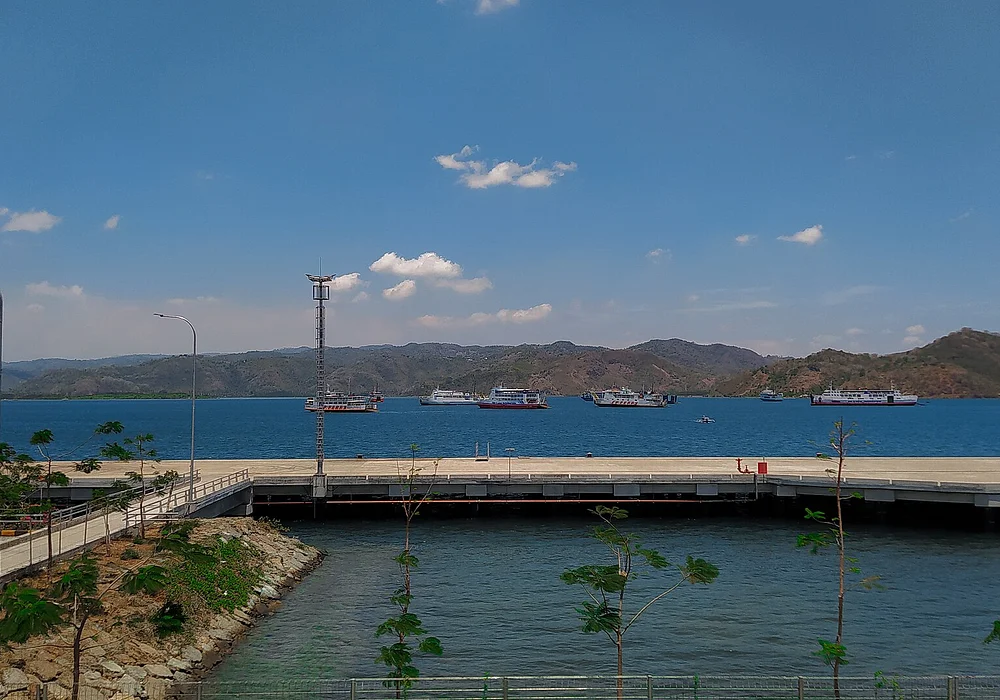 Jetty for cruise ship docking place in Gili Mas Terminal, Lombok. In the background are ships anchored offshore of Lembar Port.